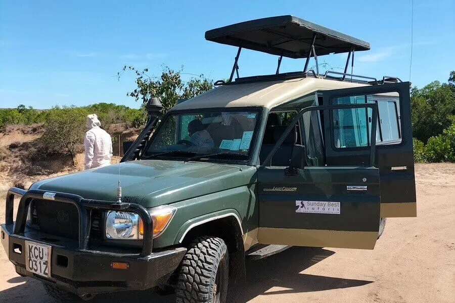 Sunday Best Safaris green land cruiser vehicle